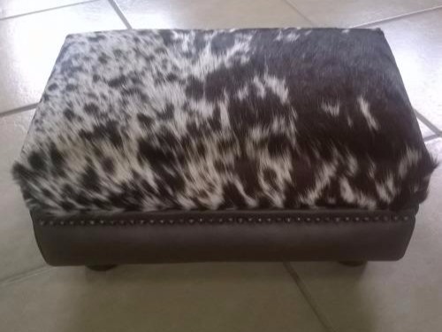 Footstools come in different colors and  made of Nguni hide and leather																