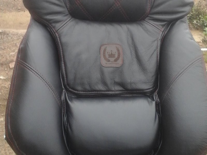 upholstery and recovering of simple furniture in genuine leather...including automobile interior res